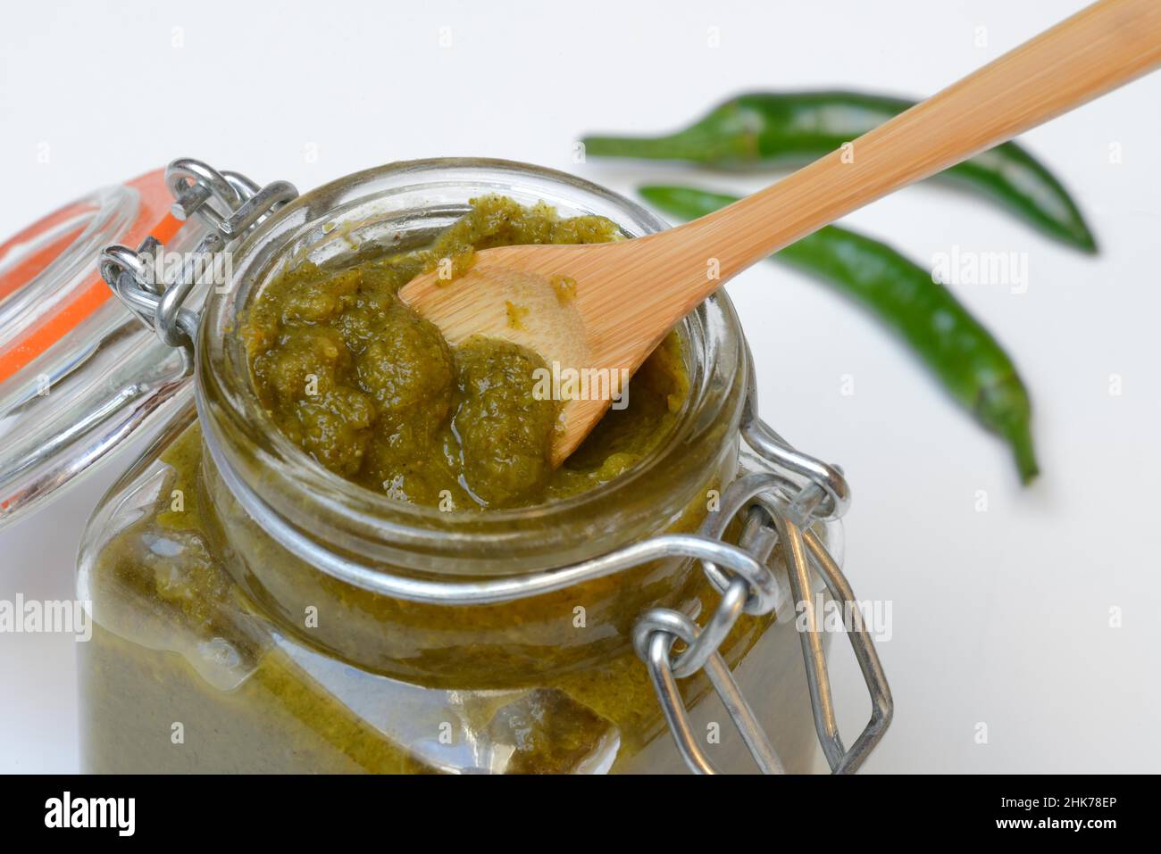 Green Thai curry paste in jar and chillies Stock Photo Alamy
