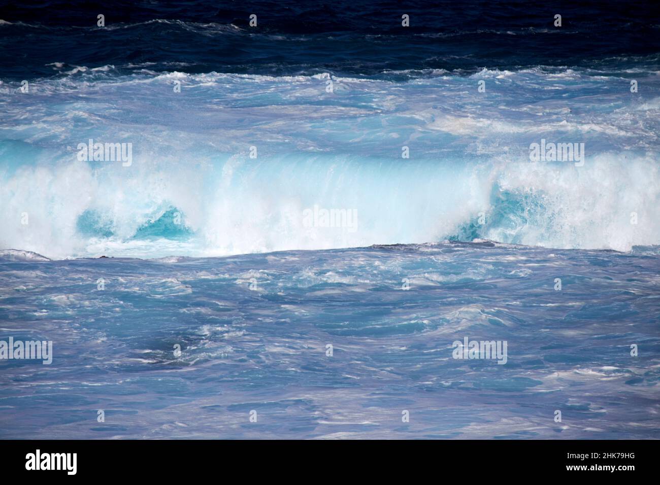 atlantic waves breaking near western shoreline of Punta Pechiguera playa blanca Lanzarote Canary Islands Spain Stock Photo