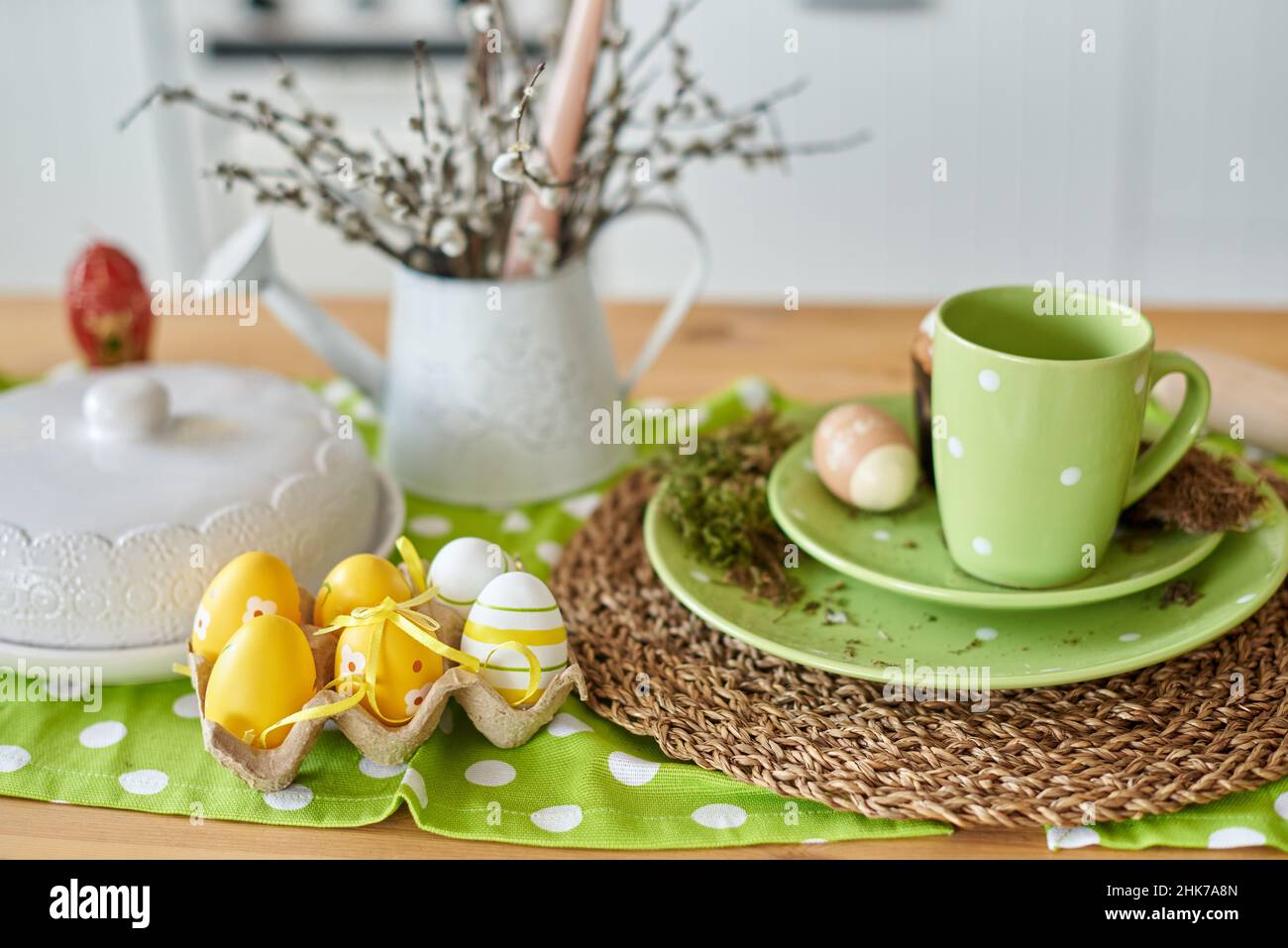 yellow Easter eggs on the table in the kitchen for decoration. Stock Photo
