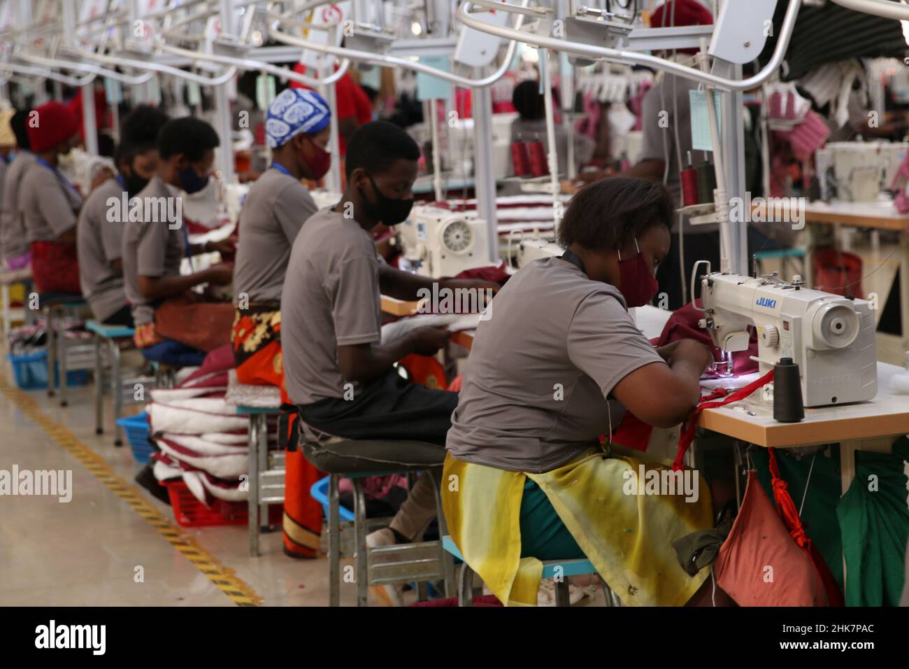 Kigali, Rwanda. 28th Jan, 2022. Rwandan people work in Chinese garment ...