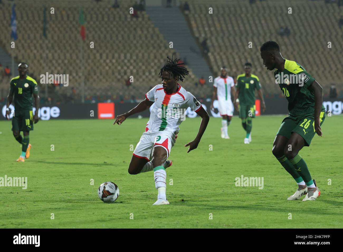 CAMEROON, Yaounde, 02 February 2022 - Issa Kabore of Burkina Faso and Pape Gueye of Senegal during the Africa Cup of Nations play offs semi final match between Burkina Faso and Senegal at Stade Ahmadou Ahidjo,Yaounde, Cameroon, 02/02/2022/ Photo by SF Stock Photo