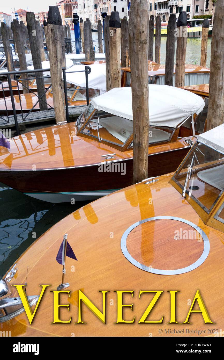 Poster of water taxi speedboats moored in the canal in Venice, 2017. Stock Photo