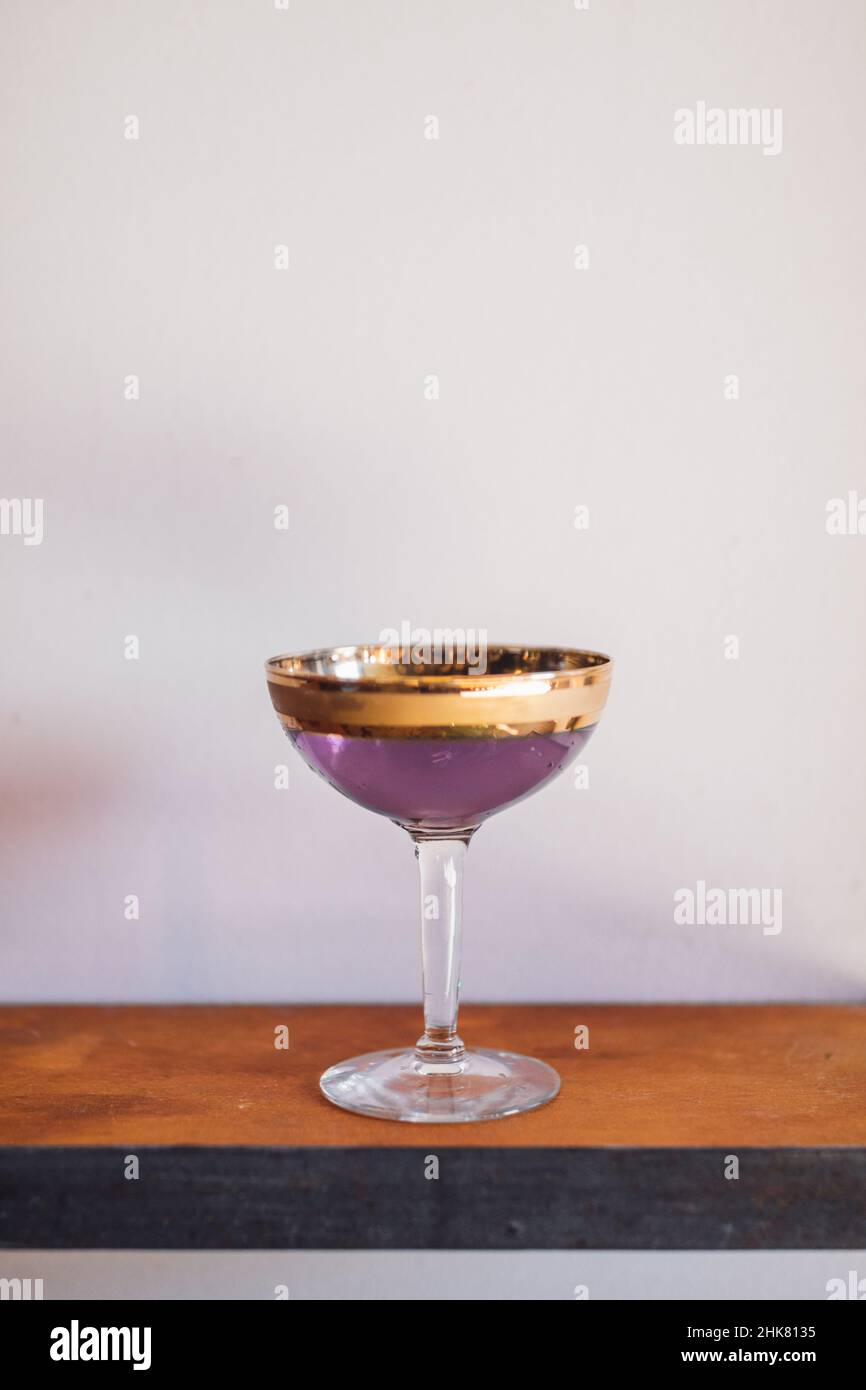 Arsenic and Old Lace, purple and gold classic cocktail Stock Photo
