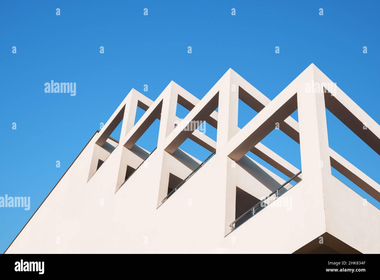 Abstract architecture geometric building modern pillar arch balcony construction. Geometry architecture design building balcony background. Modern Stock Photo