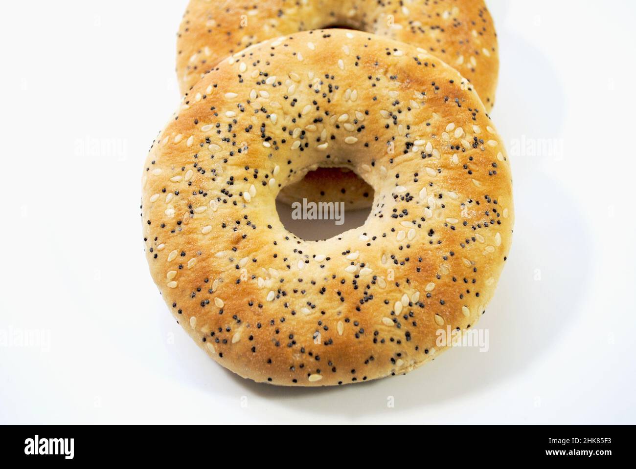 Thin Everything Bagels Isolated Over a White Stock Photo