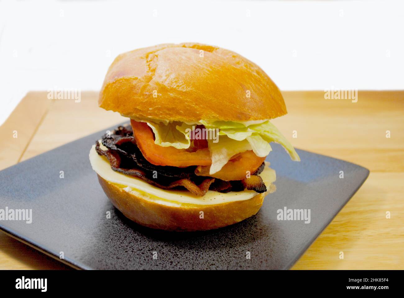 A Close-up of a Tasty BLT Sandwich on a Fresh Kaiser Roll Stock Photo
