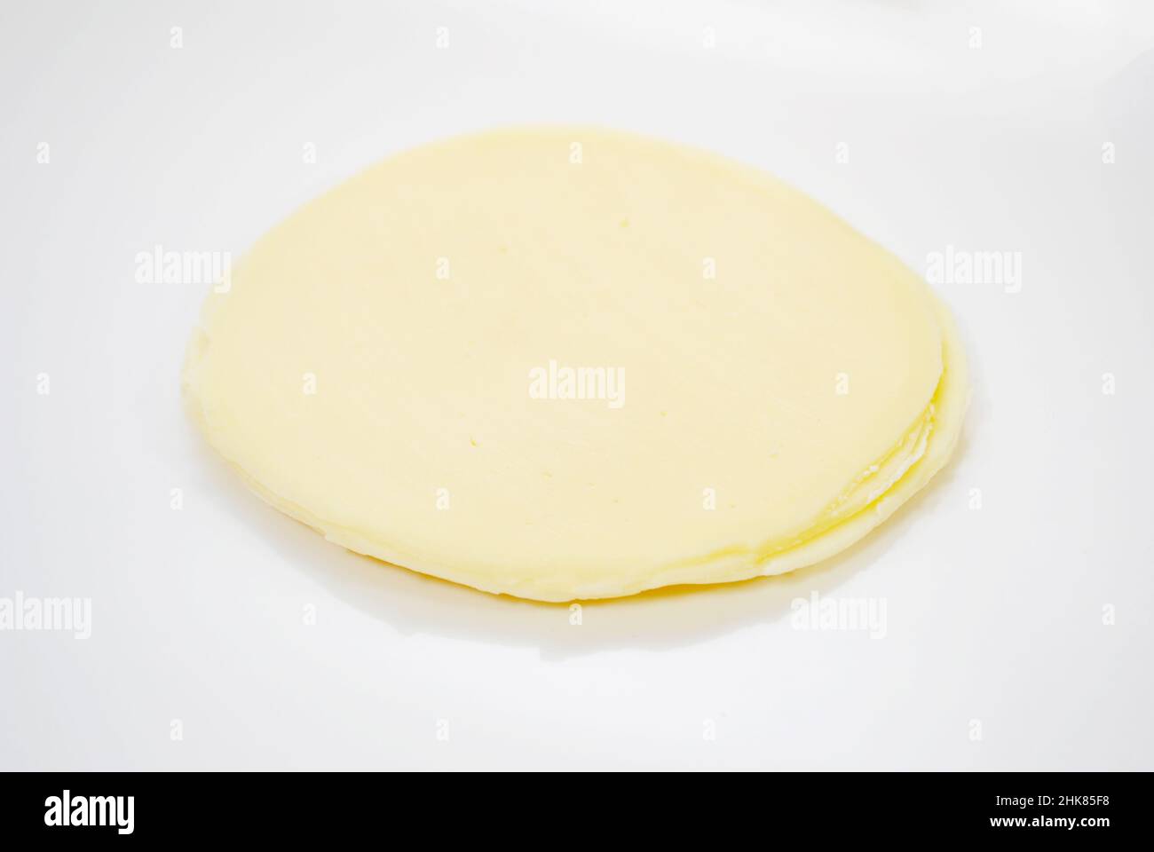 Fresh Deli Sliced Provolone Round Cheese Stock Photo Alamy