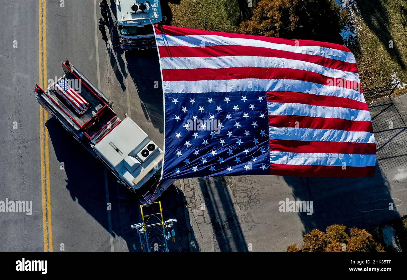 Timonium, MD, USA. 2nd Feb, 2022. February 2, 2022 Fire apparatus transport the caskets of