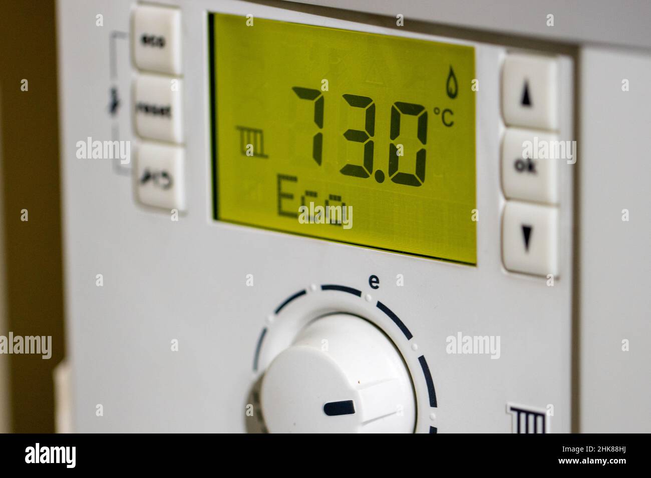 A gas boiler control panel set to eco mode Stock Photo