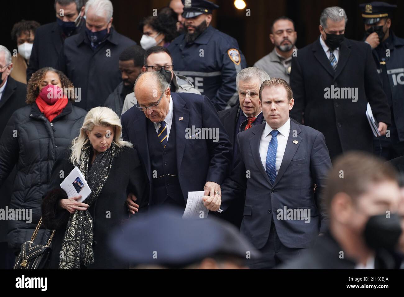 New York, United States. 01st Feb, 2022. Rudy Giuliani and his son Andrew exit St. Patrick's Cathedral at the funeral of NYPD Officer Wilbert Mora.For the second time in less than a week, mourners across New York City and the country came together to bid a final farewell to a fallen NYPD officer. Family, friends and a sea of brothers and sisters in blue gathered for the funeral for Officer Wilbert Mora at St. Patrick's Cathedral in Midtown Manhattan, with burial following in Woodside, Queens. Credit: SOPA Images Limited/Alamy Live News Stock Photo