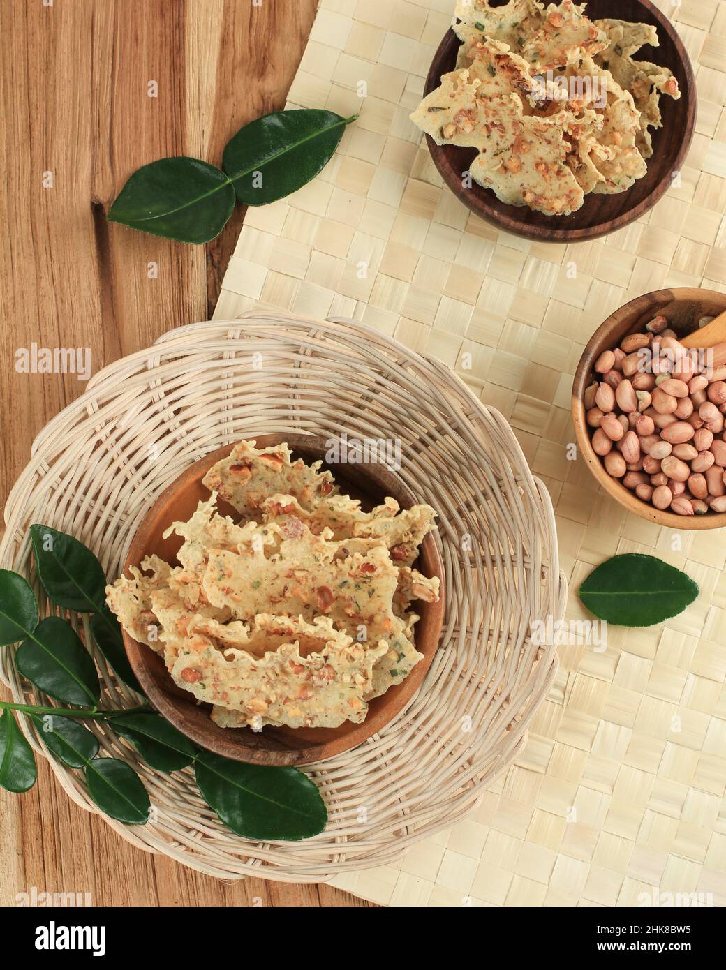 Rempeyek Kacang or Peyek Kacang is Traditional Snack from Java, Indonesia. Rempeyek is Fried Fritter  Made from Rice Flour and Water with Peanuts on T Stock Photo