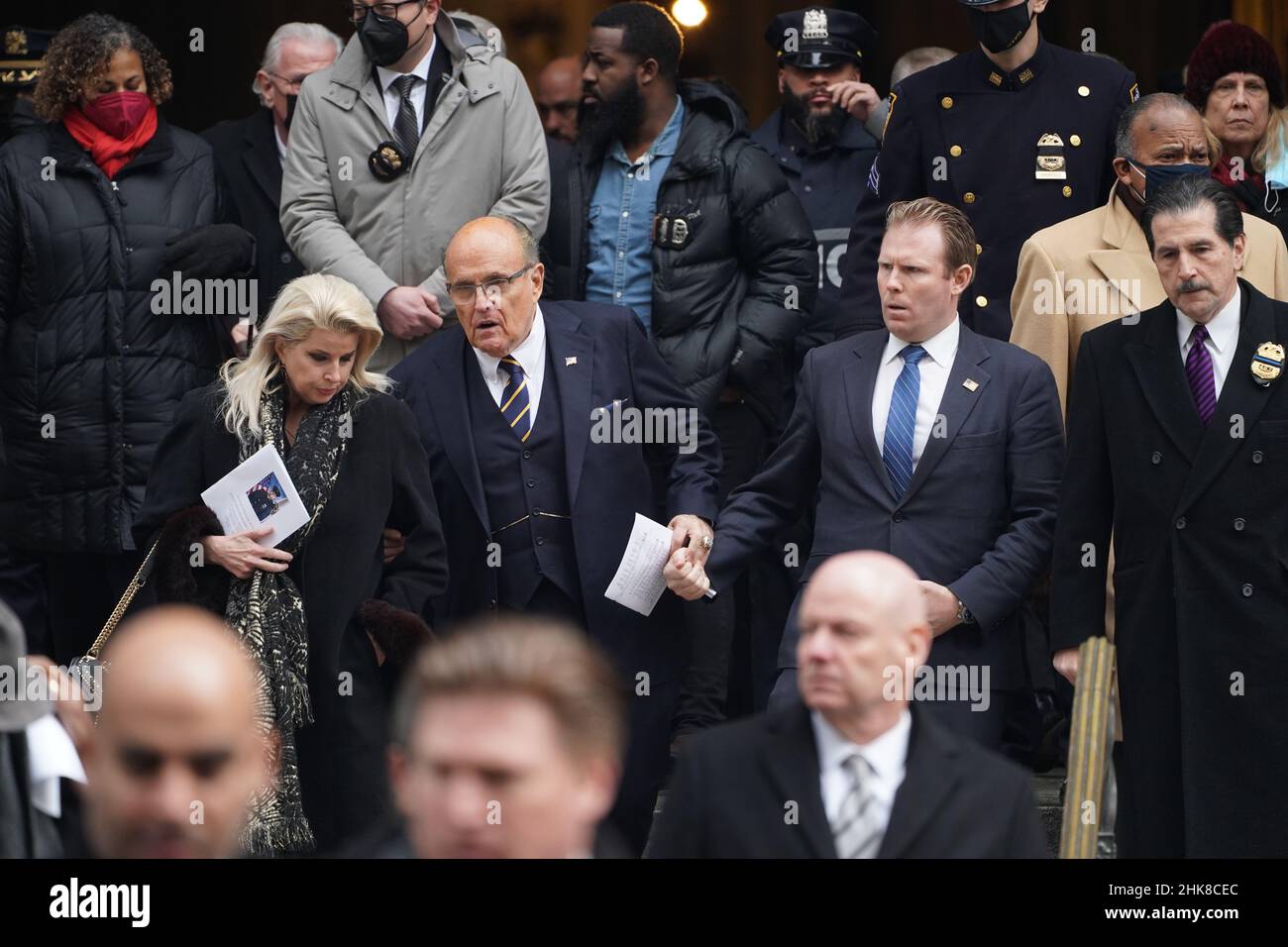 New York, United States. 01st Feb, 2022. Rudy Giuliani and his son Andrew exit St. Patrick's Cathedral at the funeral of NYPD Officer Wilbert Mora.For the second time in less than a week, mourners across New York City and the country came together to bid a final farewell to a fallen NYPD officer. Family, friends and a sea of brothers and sisters in blue gathered for the funeral for Officer Wilbert Mora at St. Patrick's Cathedral in Midtown Manhattan, with burial following in Woodside, Queens. (Photo by Catherine Nance/SOPA Images/Sipa USA) Credit: Sipa USA/Alamy Live News Stock Photo