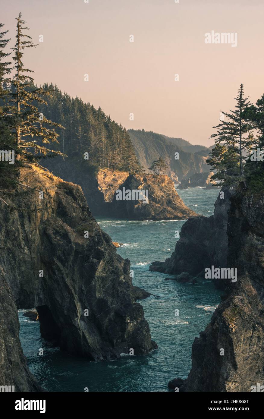 Sunset on natural bridges along the west coast of the Pacific Ocean ...