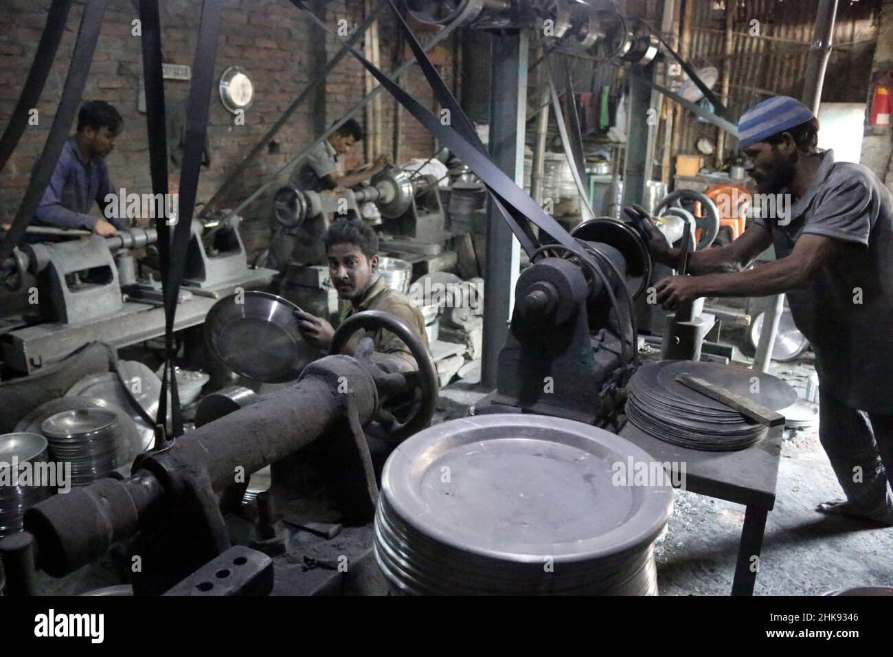 FEBRUARY 02,2022,DHAKA,BANGLADESH Workers make utensils in an