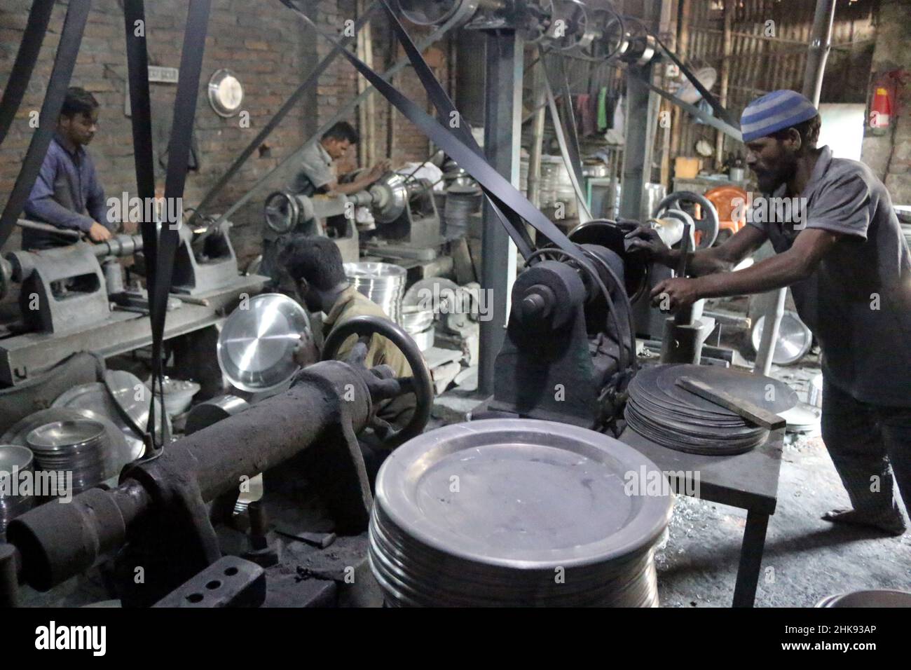 FEBRUARY 02,2022,DHAKA,BANGLADESH Workers make utensils in an unhealthy environment at an