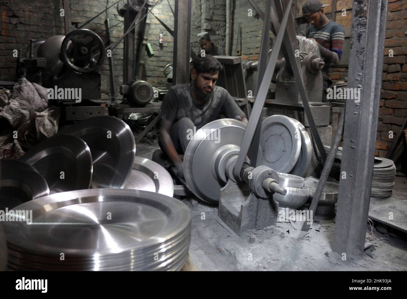 FEBRUARY 02,2022,DHAKA,BANGLADESH Workers make utensils in an unhealthy environment at an