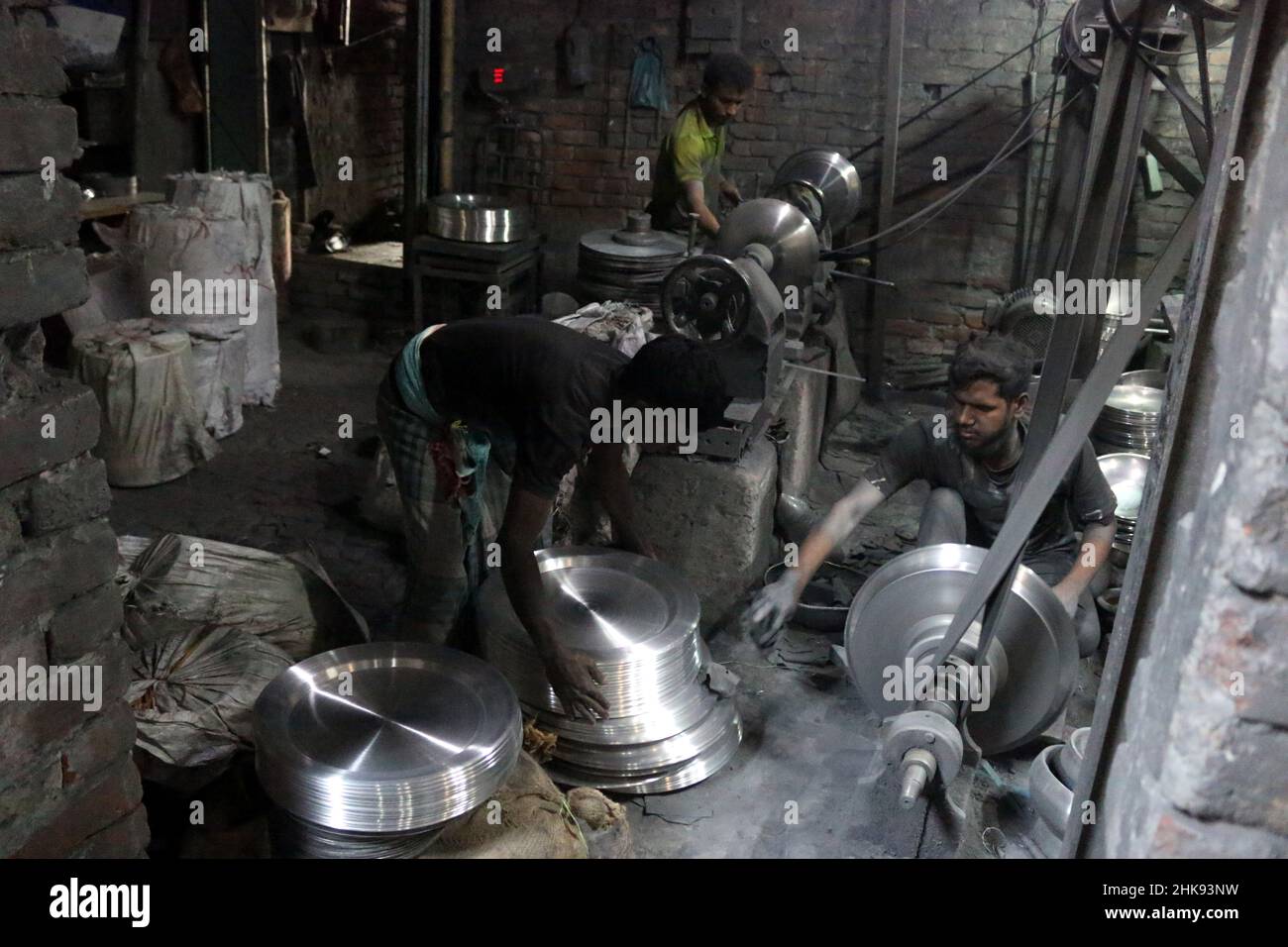 FEBRUARY 02,2022,DHAKA,BANGLADESH Workers make utensils in an unhealthy environment at an
