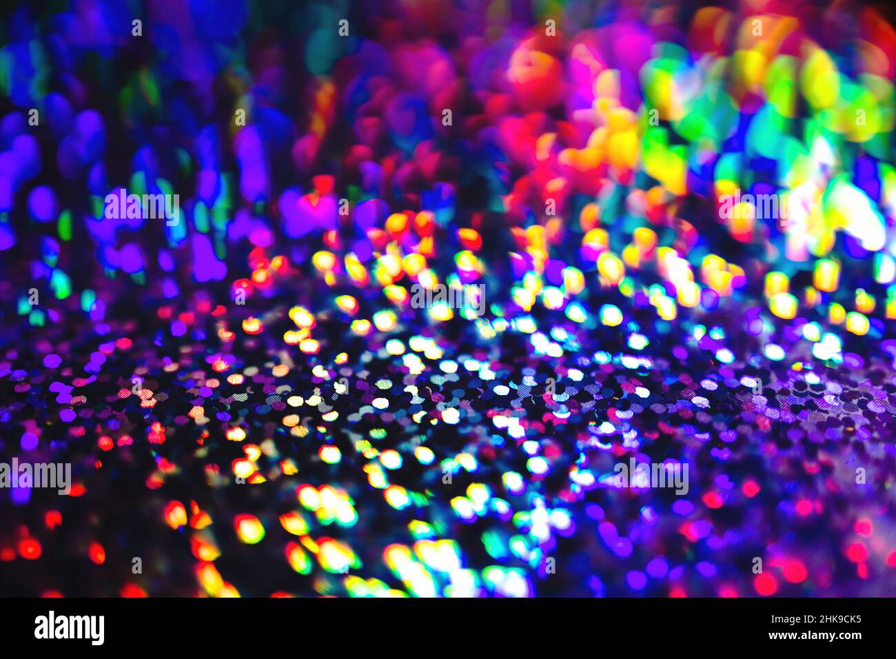 Blurred Neon rainbow glittering lights with glow effect abstract
