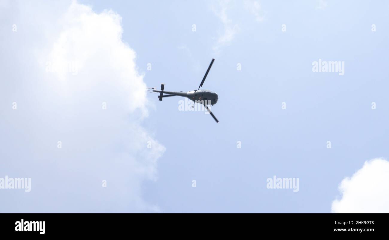 Helicopter in the sky. Against the backdrop of dim skies Stock Photo
