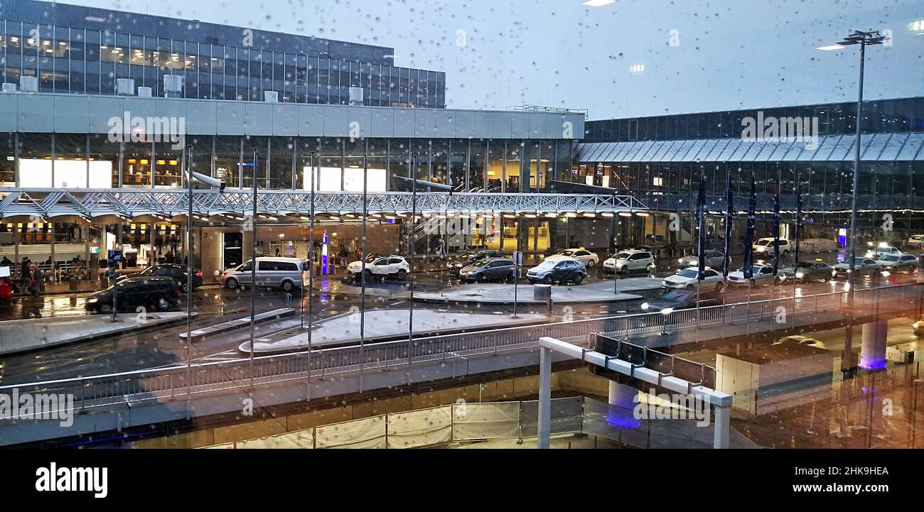 Frankfurt-am-Maim airport at night during the winter months in snow and rain. Stock Photo