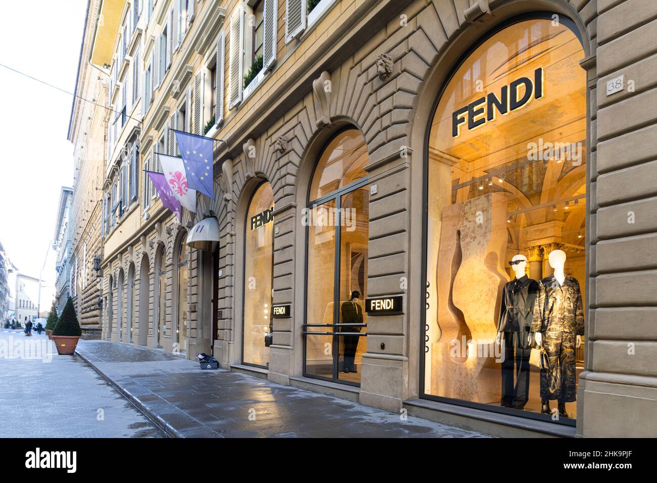 People Walking In Front Fendi Window Display In Florence Tuscany