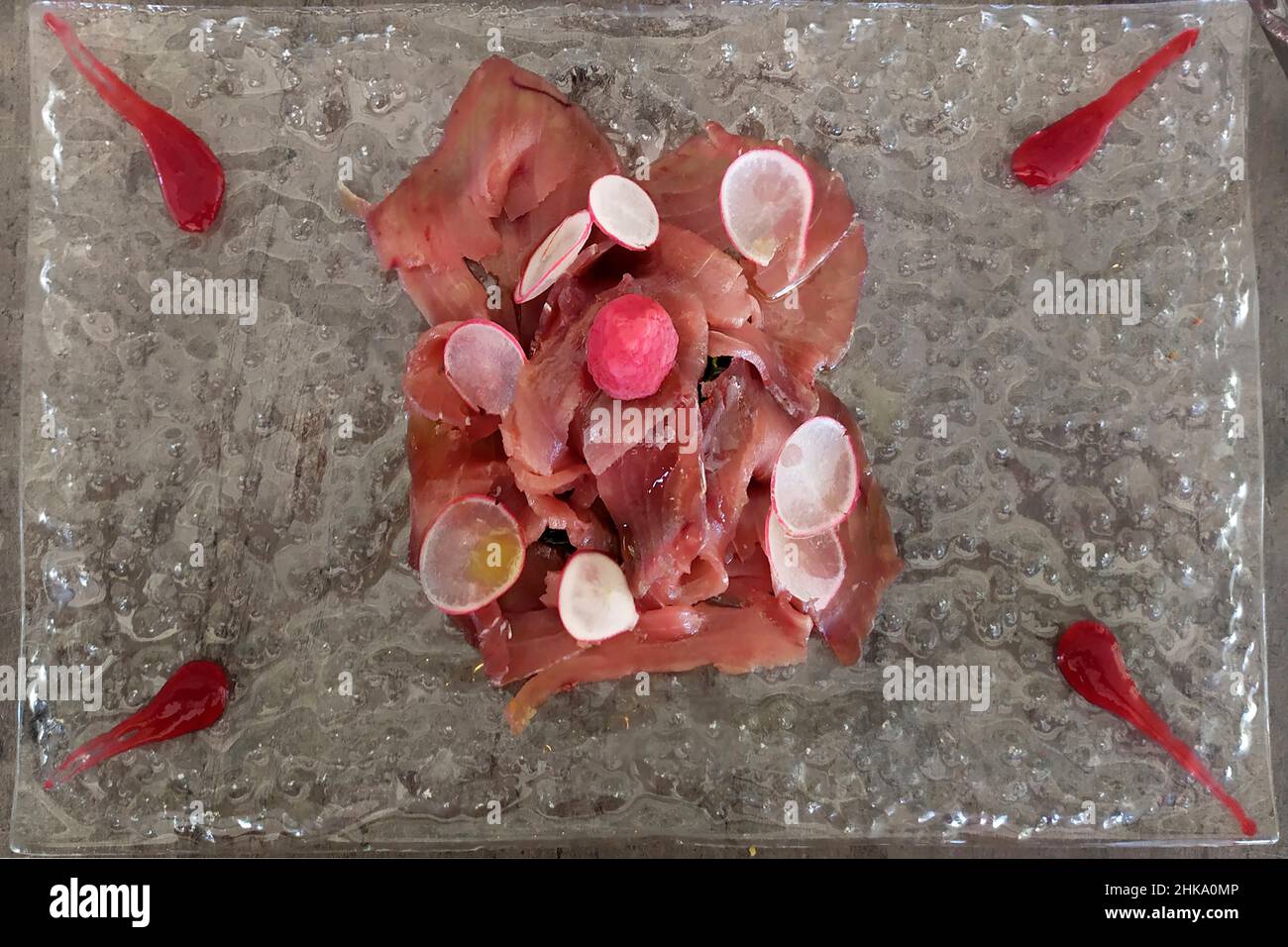 Food, Carpaccio of yellow fin tuna marinated in raspberry with agretti
