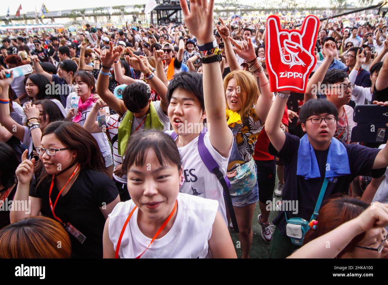 Fans enjoying rock music with slam during an Pentaport Rock Festival at the  Songdo, Near IFEZ in Incheon. Festival held Aug 1 to3th three day schedule every year. Stock Photo