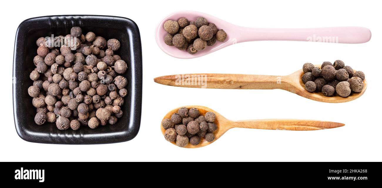 set of various allspice jamaica peppers isolated on white background