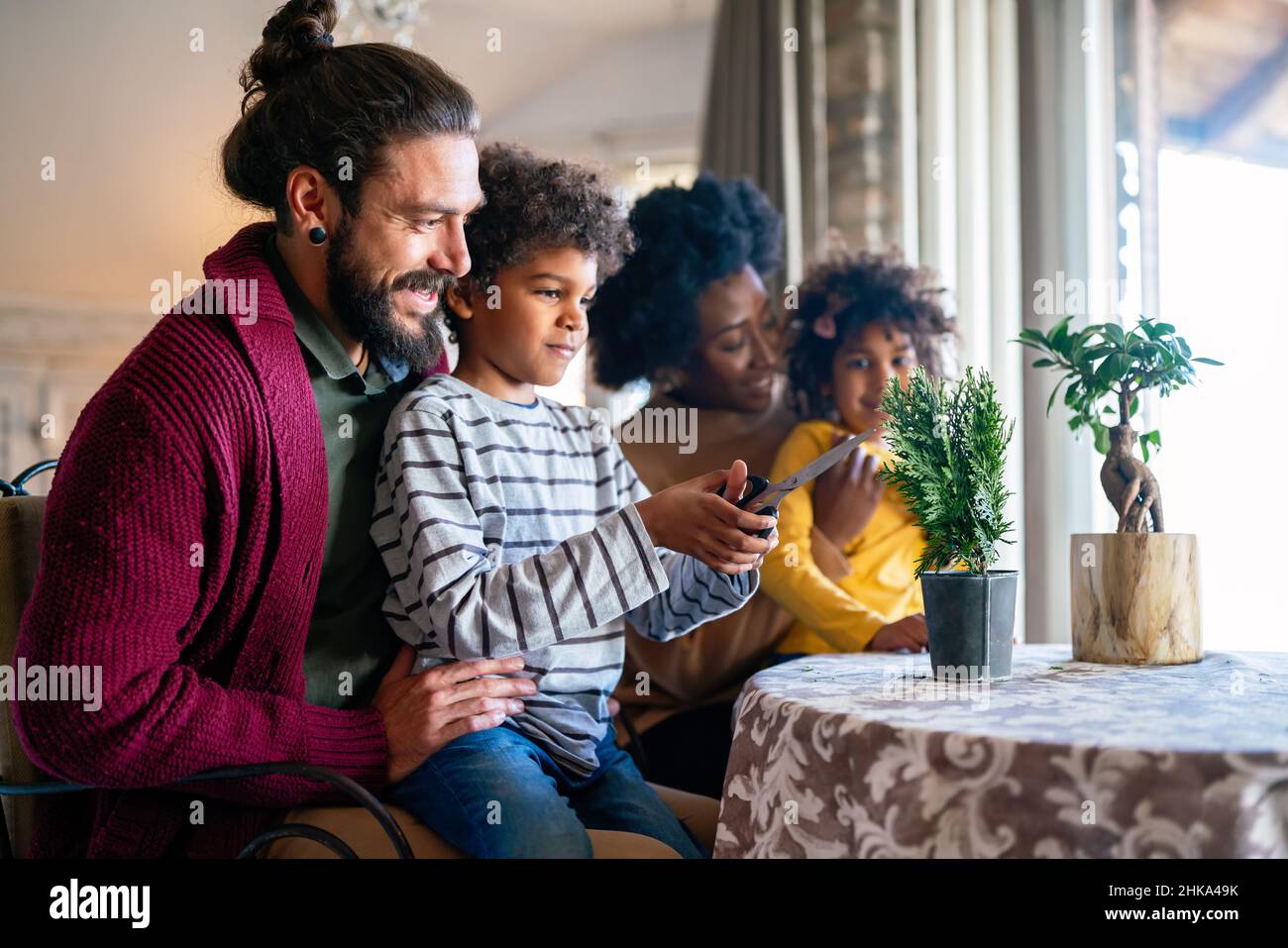 Home hobbies gardening with children and learning botany. Family love happiness concept Stock Photo