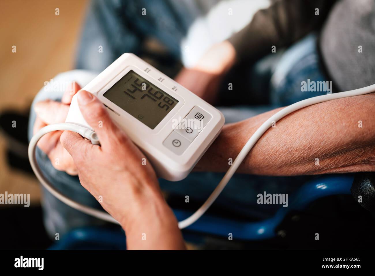 People check blood pressure and heart rate with digital measurement