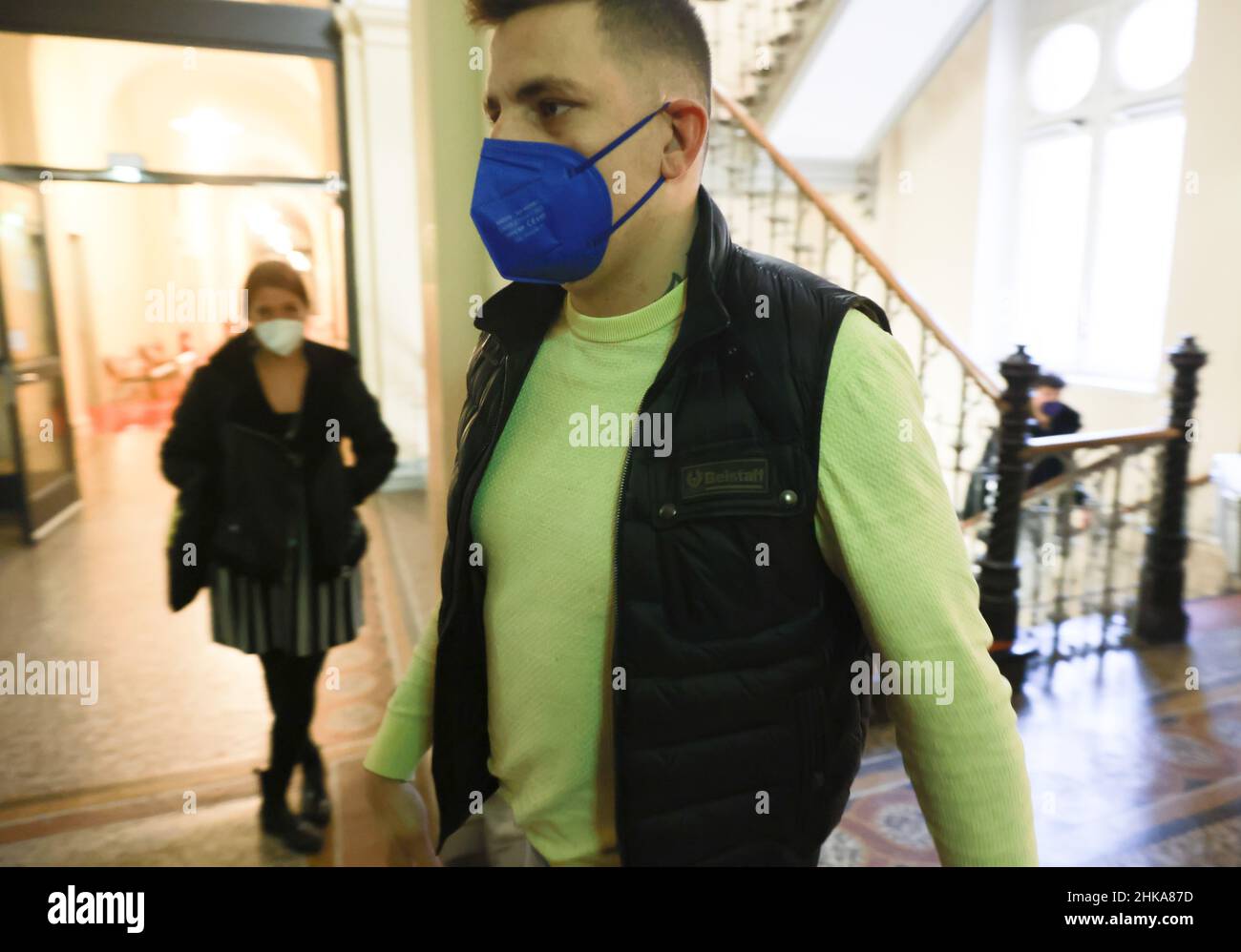 Hamburg, Germany. 03rd Feb, 2022. Rapper Gzuz walks into the courtroom at  the Criminal Justice Building in Hamburg, Germany, where the continuation  of the appeal hearing against him is being heard. At