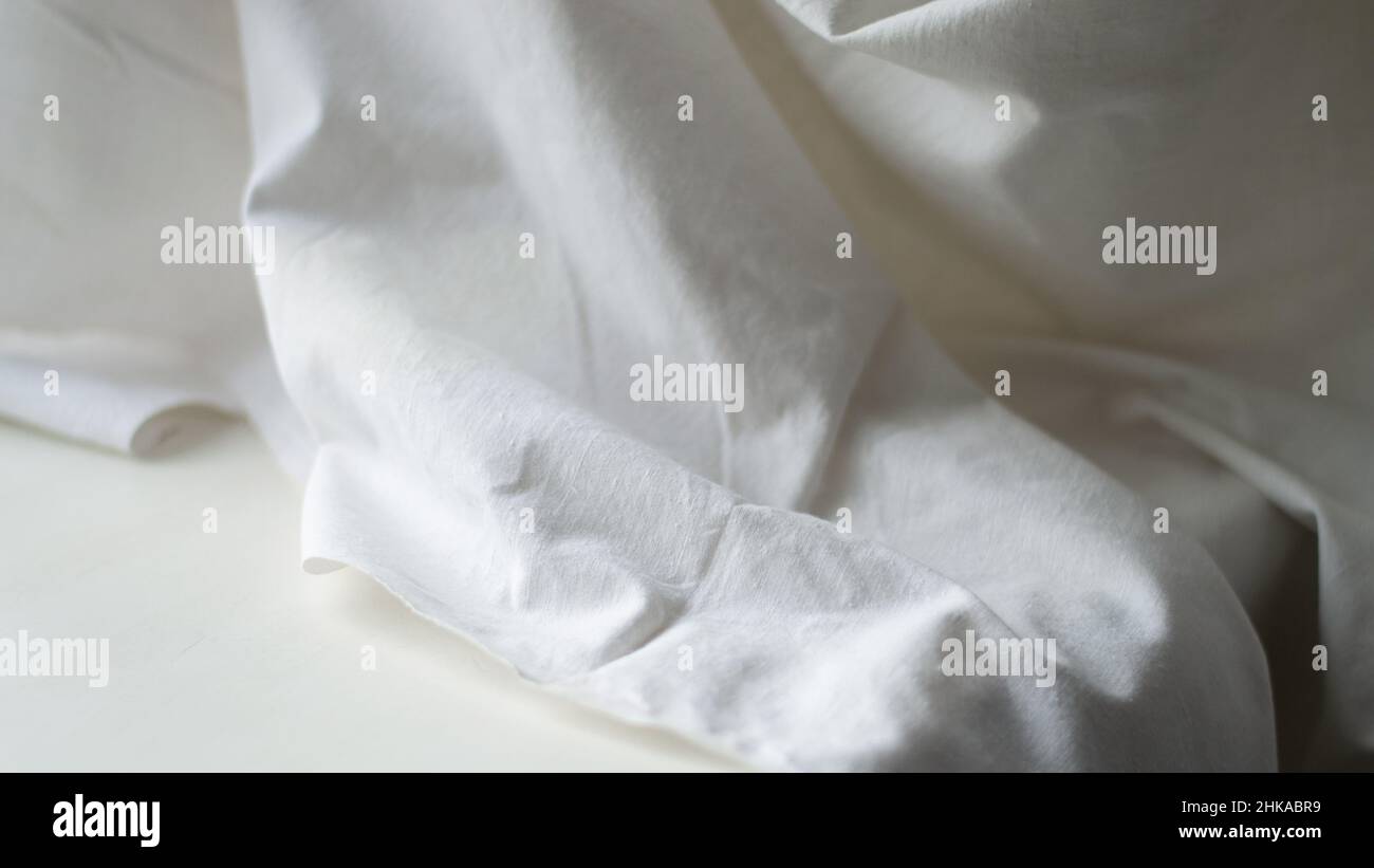 White linen abstract folded texture background Stock Photo