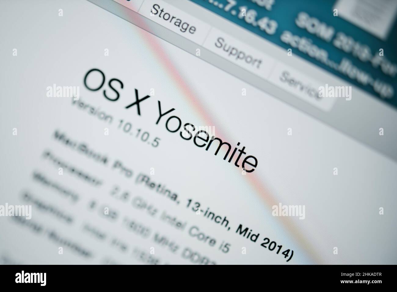 London, United Kingdom - Dec 25, 2018: Tilt-shift lens close-up view of Upgrade to MacOs Yosemite operating system on the Apple Computers MacBook Pro laptop Stock Photo
