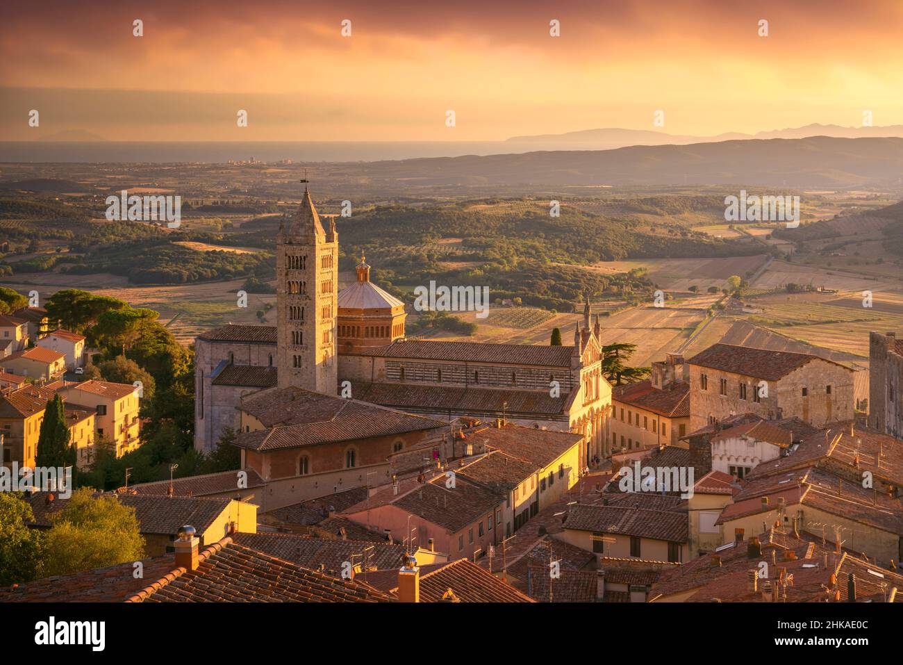 Massa Marittima old town and San Cerbone Duomo cathedral at sunset. Tuscany, Italy. Stock Photo