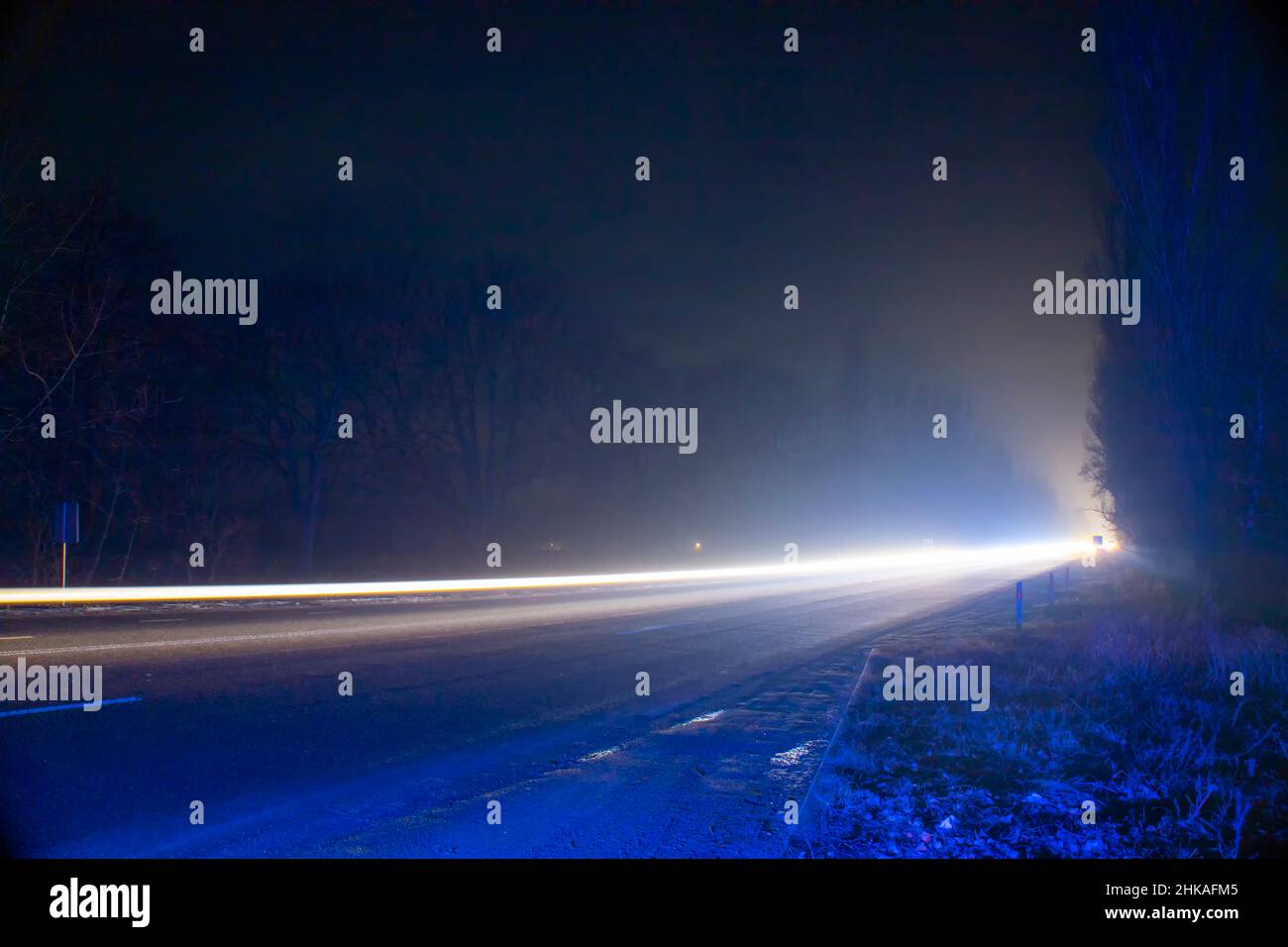 Red and white lights from passing cars. Night highway Stock Photo Alamy