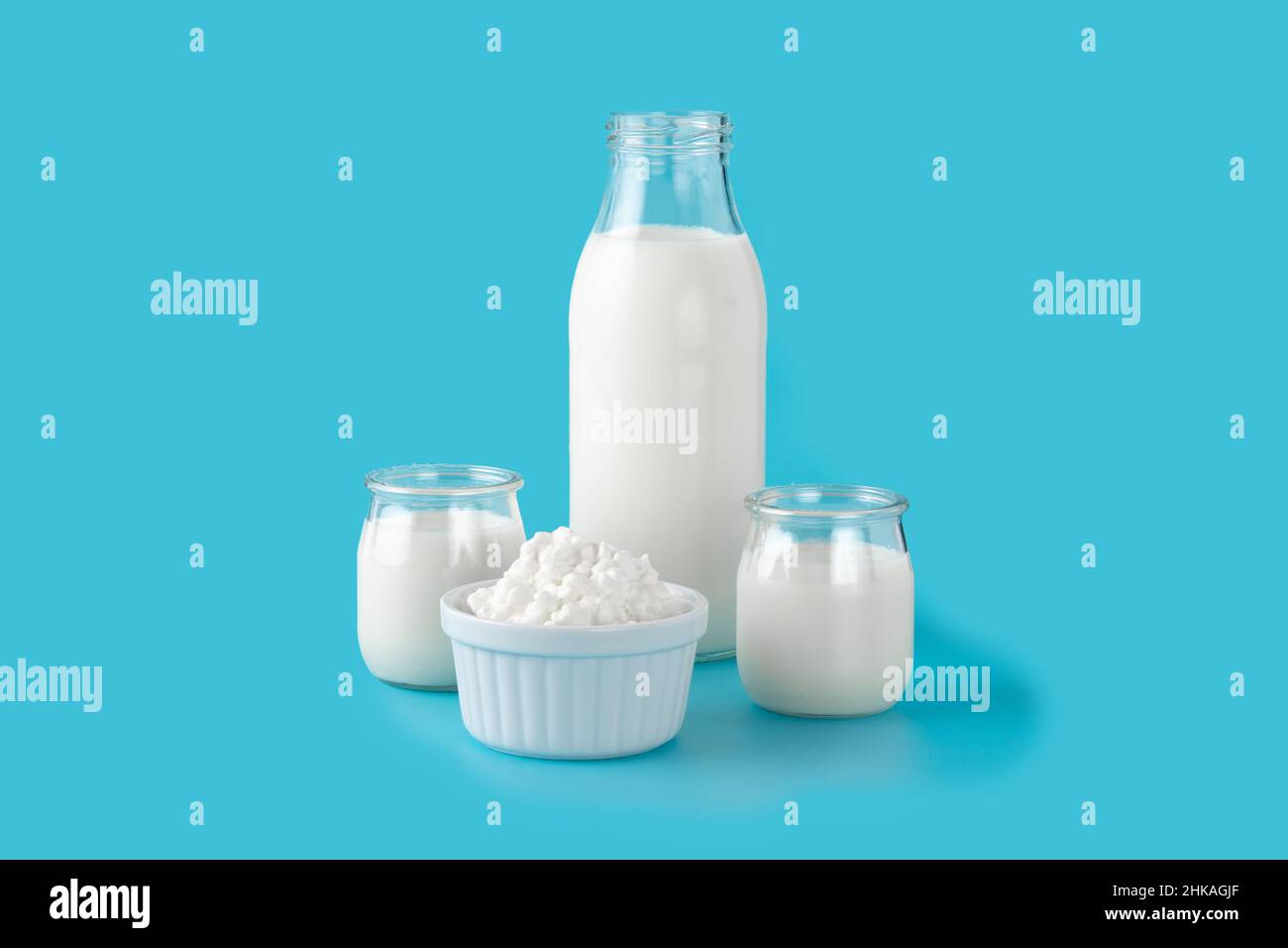 Milk kefir drink on blue background.Liquid and fermented milk product