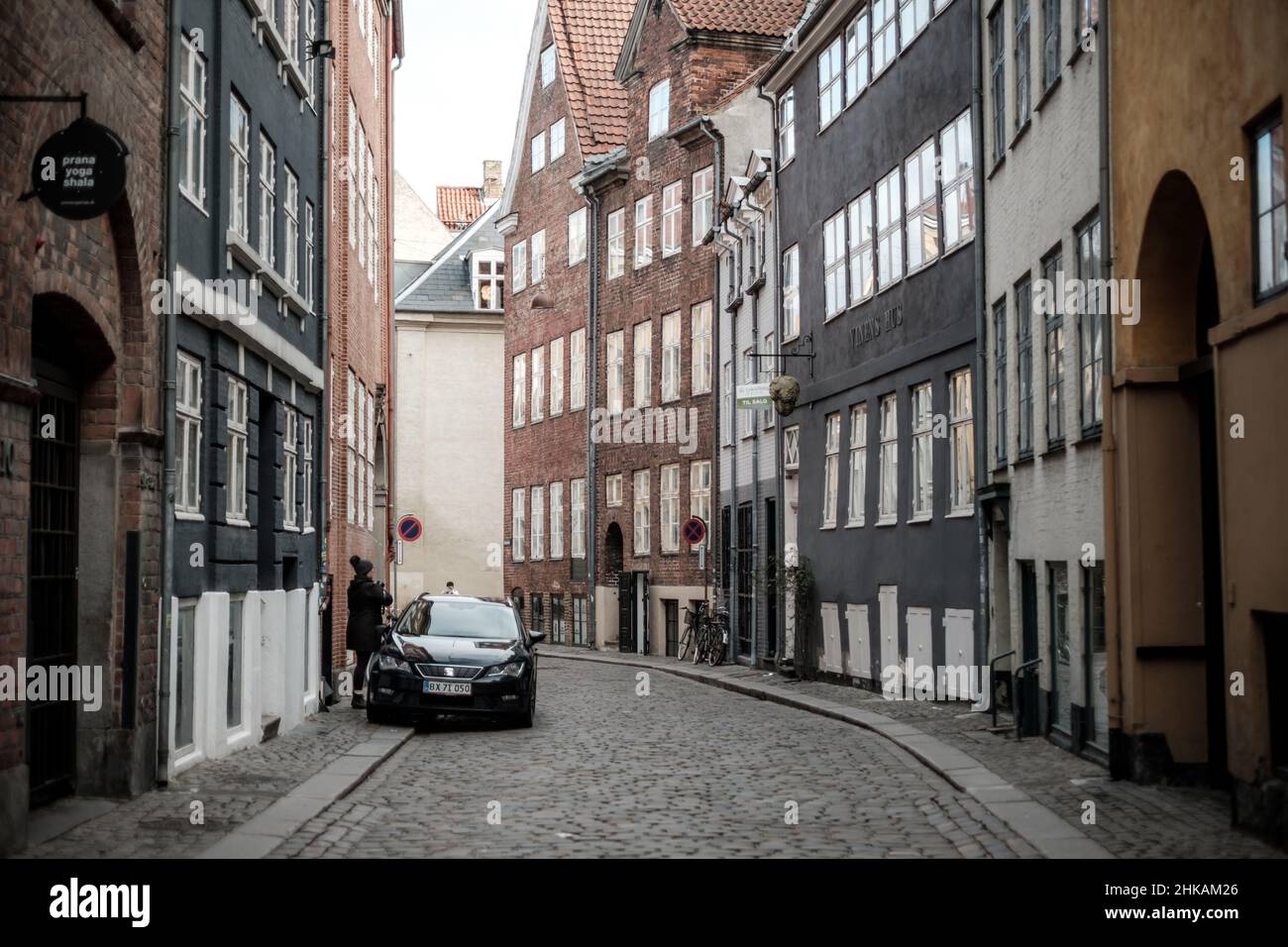 Magstraede is one of two of the oldest streets in Copenhagen. The road was created in 1520 when the coastline was moved to present day Nyropgade. Stock Photo