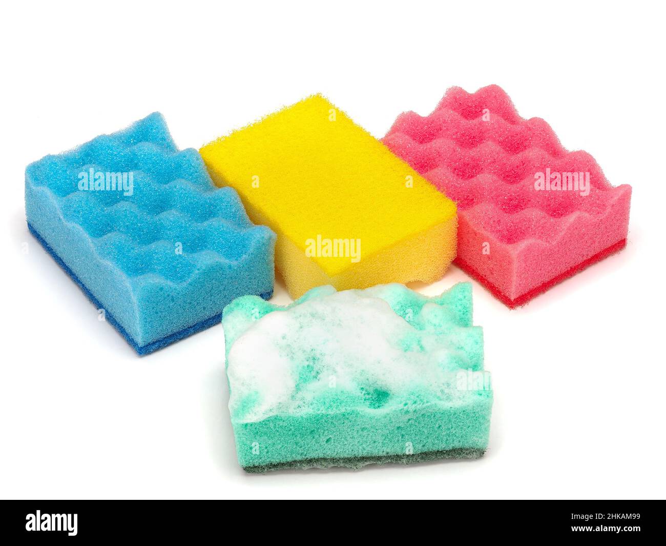 Colored sponges for washing dishes and other domestic needs. Stock Photo