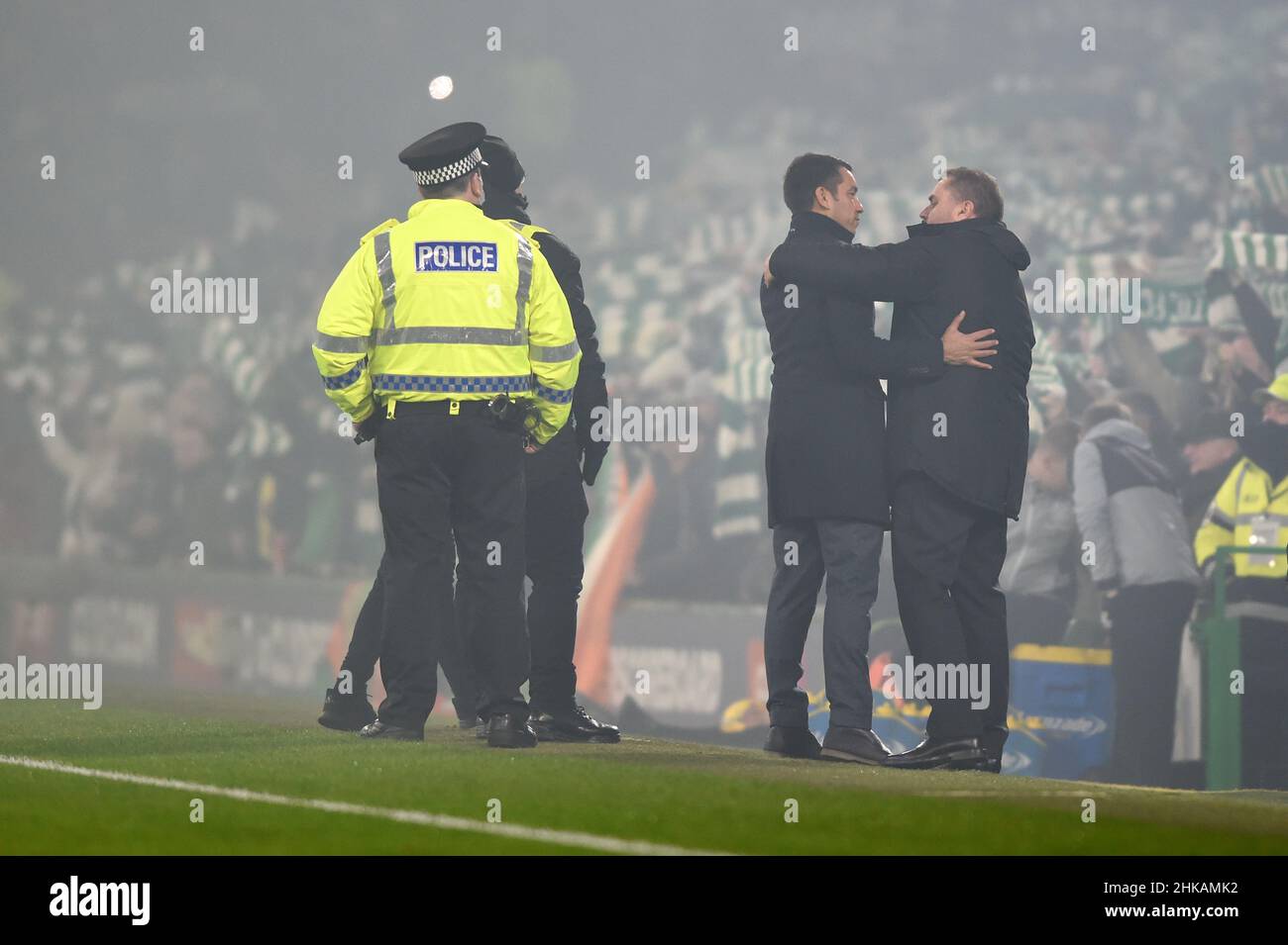 Glasgow, Scotland, 2nd February 2022. Rangers Manager Giovanni van Bronckhorst greets Ange Postecoglou Coach of Celtic  before the cinch Premiership match at Celtic Park, Glasgow. Picture credit should read: Neil Hanna / Sportimage Stock Photo