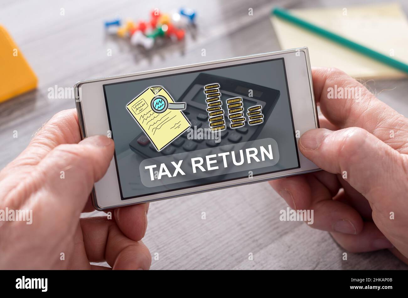 Example Cell Phone Return Tax return concept on mobile phone Stock Photo - Alamy