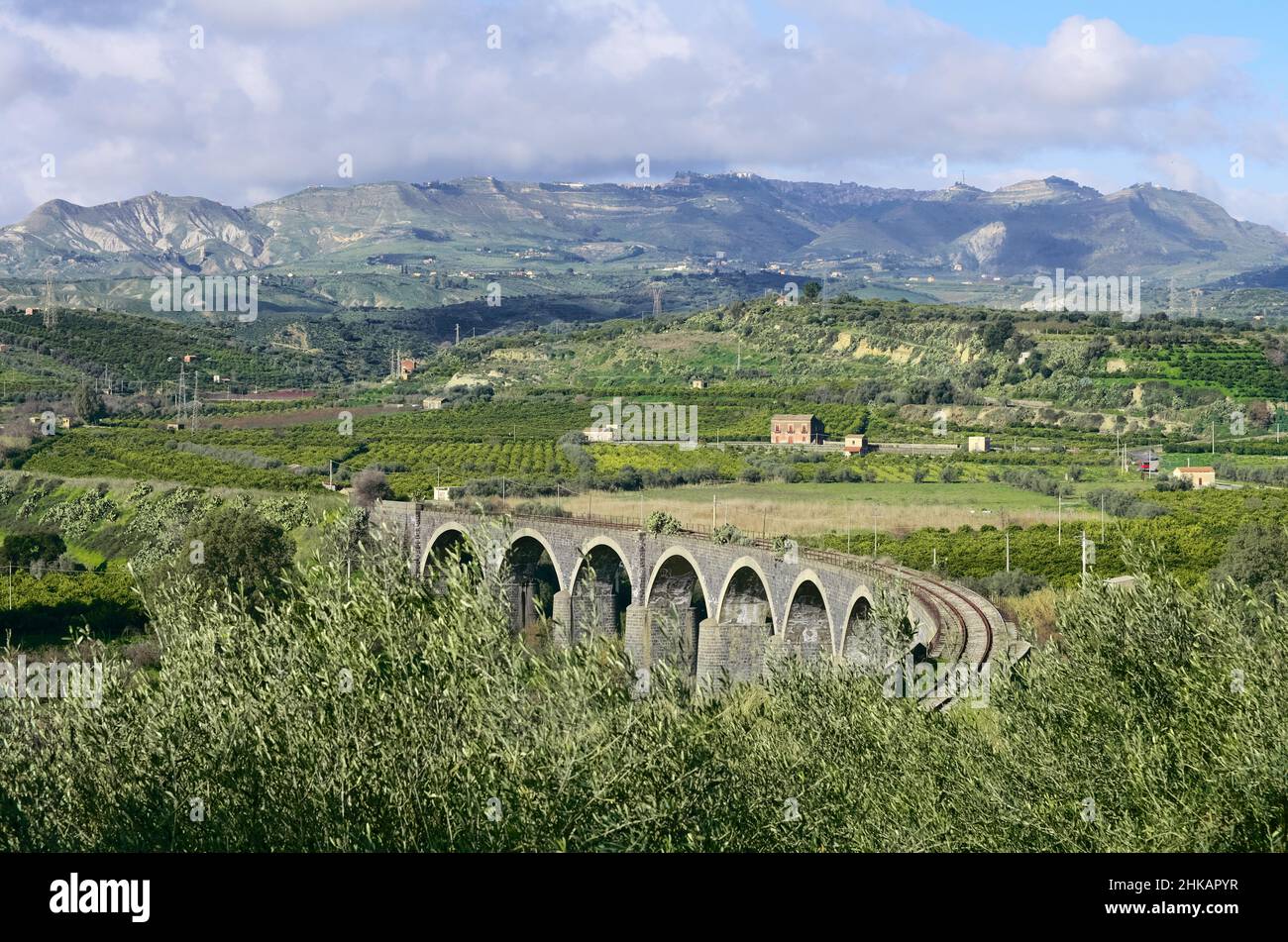 an old and abandoned railway bridge in a beatiful sicilian countryside Stock Photo