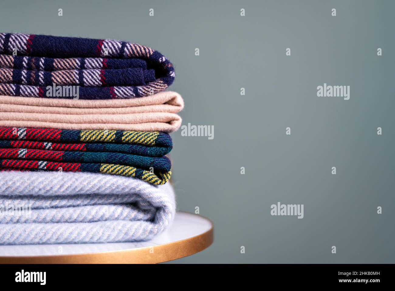 Stack of woolen checked blankets Stock Photo