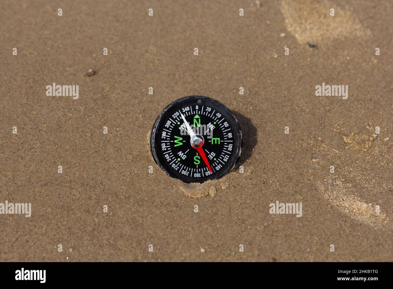 Laying compass hi-res stock photography and images - Alamy