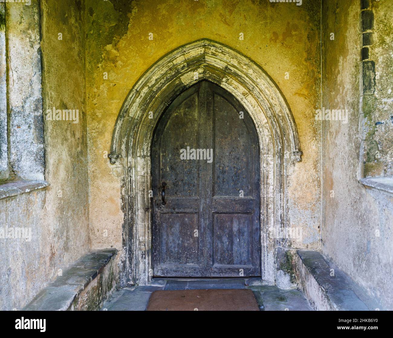 Wooden entrance door to St Margaret's Church, Cley-Next-The-Sea, a coastal village in Norfolk, East Anglia, England Stock Photo