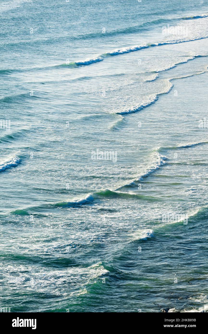 Sea waves in the evening light, vertical, Normandy coast, Manche, France Stock Photo