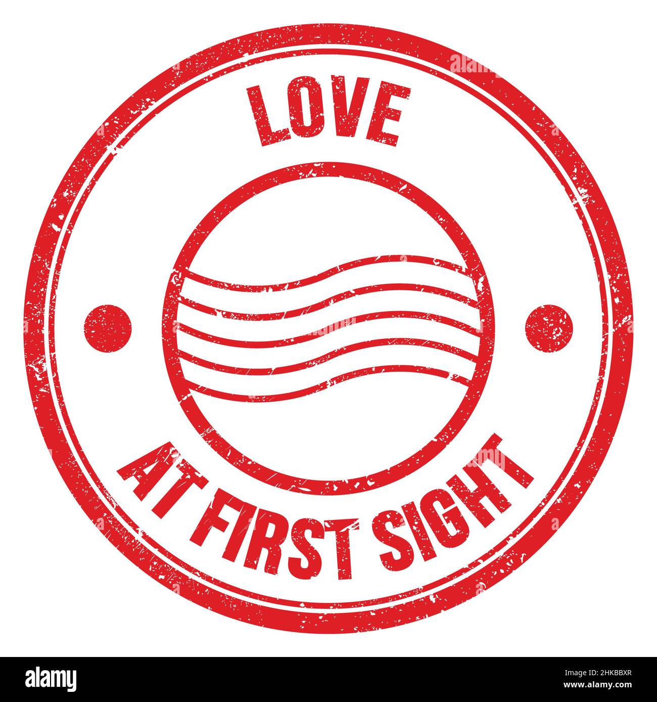 LOVE AT FIRST SIGHT text written on red round postal stamp sign Stock Photo