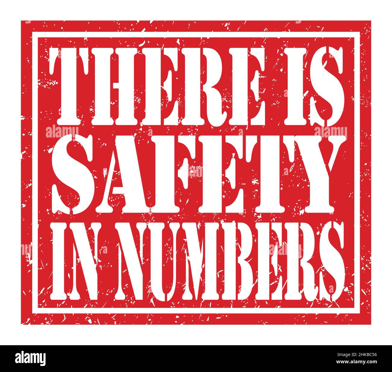 THERE IS SAFETY IN NUMBERS, words written on red stamp sign Stock Photo