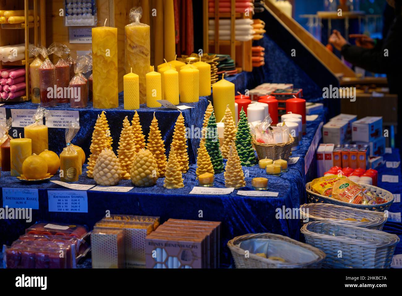 A stall at the Christmas market sells candles in Düsseldorf, NRW, Germany on Dec. 11, 2021. Stock Photo