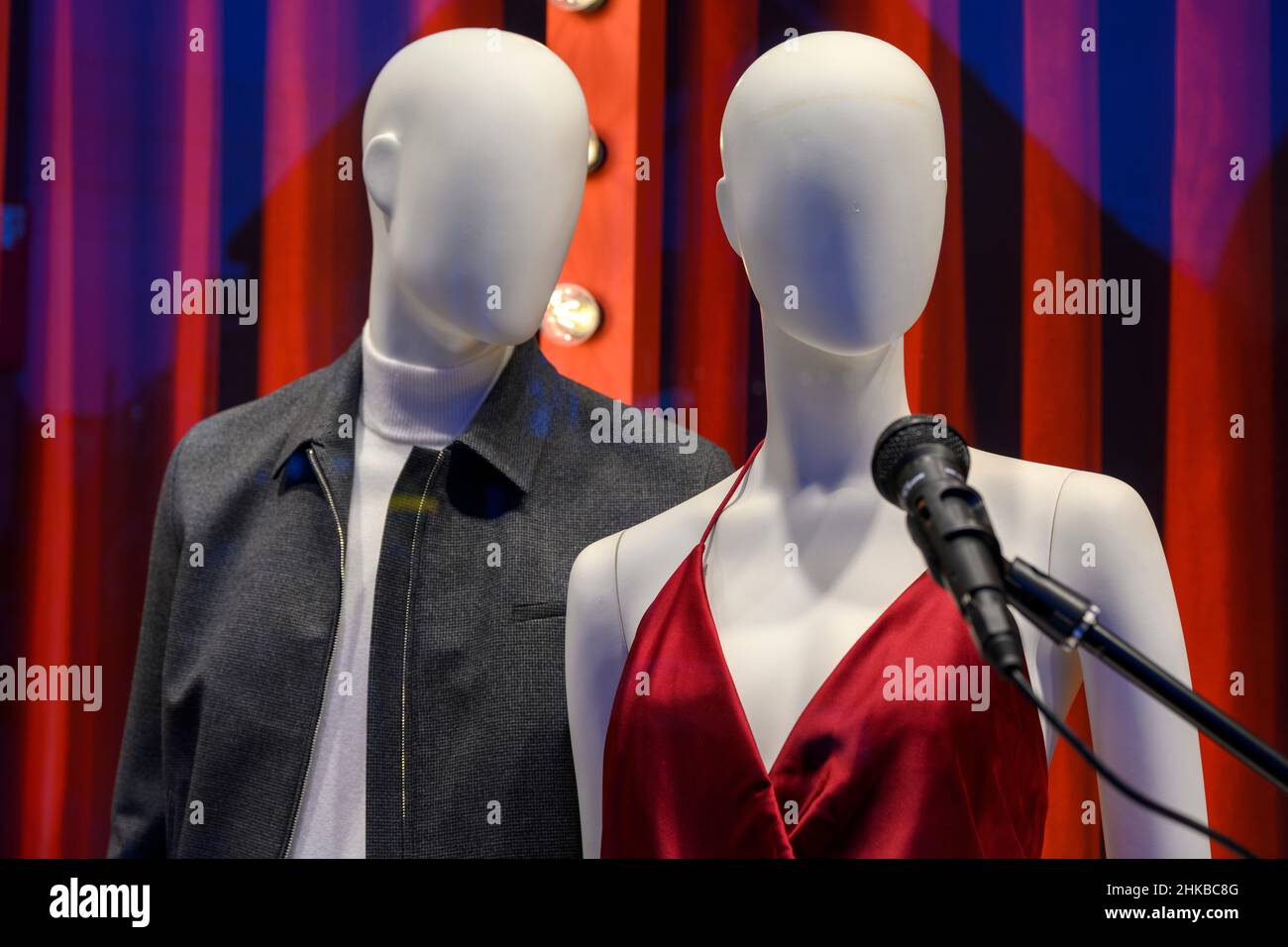 Male and female mannequin in evening dress in the city centre of Düsseldorf, NRW, Germany on 11.12.2021 Stock Photo