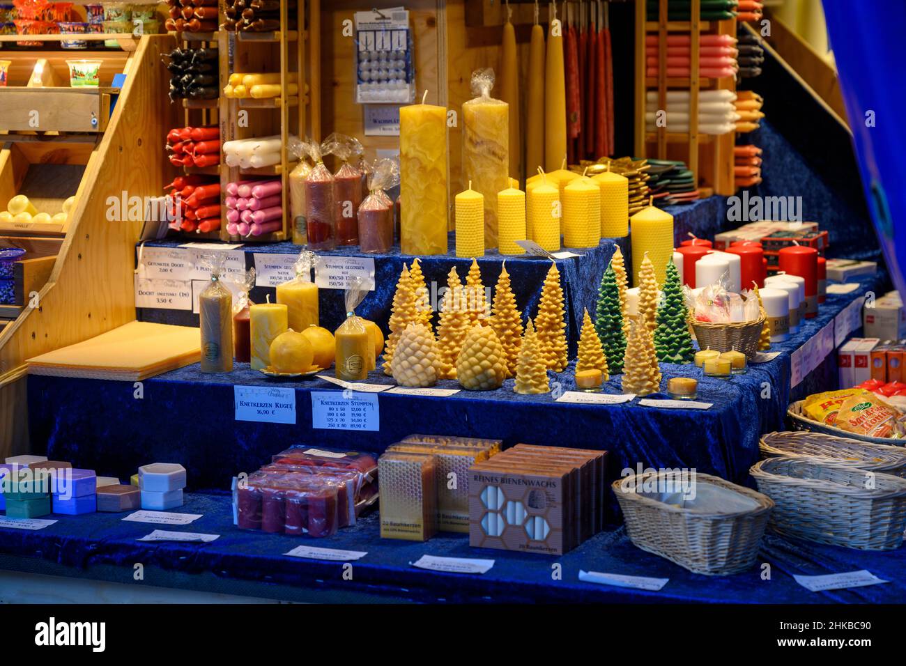 A stall at the Christmas market sells candles in Düsseldorf, NRW, Germany on Dec. 11, 2021. Stock Photo
